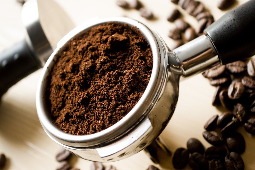 Spent coffee grounds in a portafilter